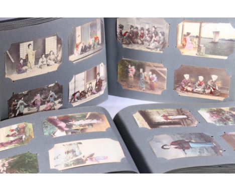 Two albums of approximately 336 early 20th century Japanese coloured picture postcards depicting Japanese life, cards include