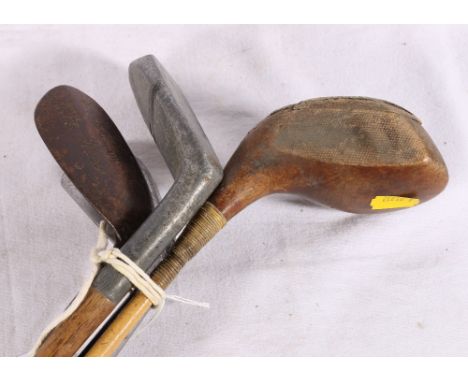 Four golf clubs including Imperial Golf Company Flat XX putter, Tom Watt magic machie niblick, Gordon Downie of Newbiggin 2 i