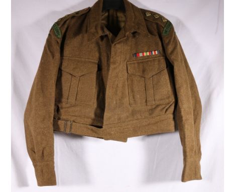 Army unifrom dress khaki jacket or tunic with Intelligence Corps cloth shoulder title badges and medal ribbons for Italy star