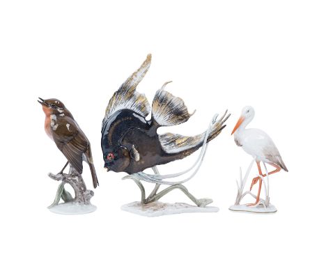 ROSENTHAL 3 Vogelfiguren, nach 1957. Weißporzellan polychrom gefasst, Entwürfe von Fritz Heidenreich (1895-1966), 1 Storch, M