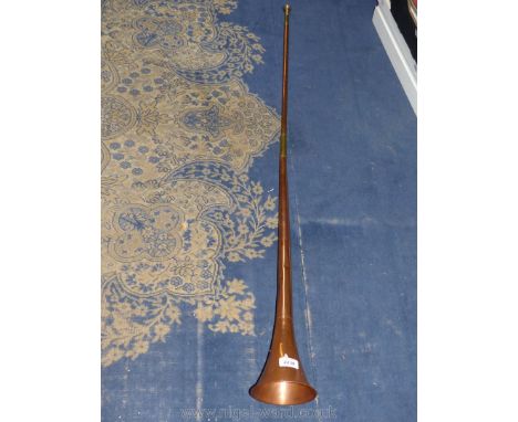 A Brass/copper hunting Horn, 50" long.