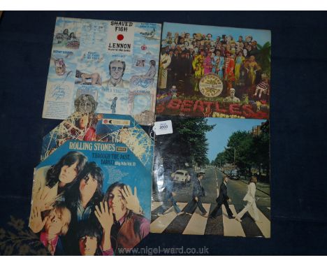 Four Rolling Stones and Beatles LP records; Through the Past Darkly (Decca 1969), Beatles Abbey Road (Apple 1969 early sleeve