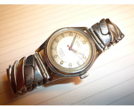 An ''Arcadia automatic Waterprotected Incabloc 17 jewels Swiss Made" Wristwatch having a bi-colour metal finish face with Ara