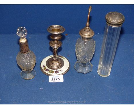 A silver lidded hat pin jar, Birmingham 1907, two scent bottles and a Birmingham enamel and silver candlestick, a/f