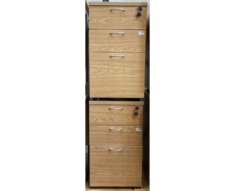 Three light oak three drawer filing pedestals. - THIS LOT IS TO BE COLLECTED BY APPOINTMENT FROM DUGGLEBY STORAGE, GREAT HILL