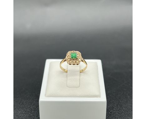 A 9ct yellow gold cz dress ring,
size J,
1.42 grams in weight,