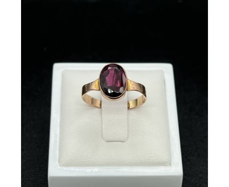 An 9ct rose gold and garnet stone set Victorian ring,
size M,
1.7 grams in weight approx