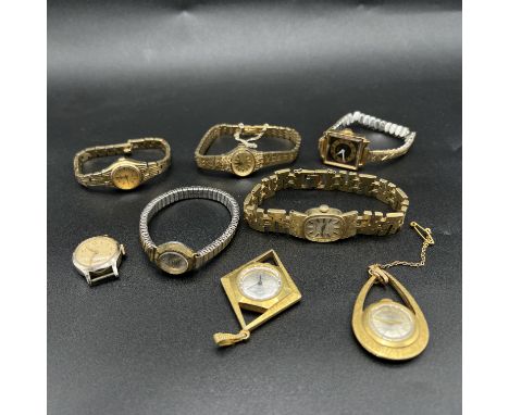 A vintage Timex watch and other watches,
8 vintage ladies watches,
sold as spares or repairs,