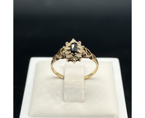 A 9ct yellow gold cz dress ring,
ring has heart shoulders and a cz sapphire centre stone,
weight 1.5 grams approx,
size L