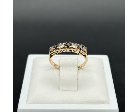 A 9ct yellow gold ring,
size G,
1.47 grams in weight