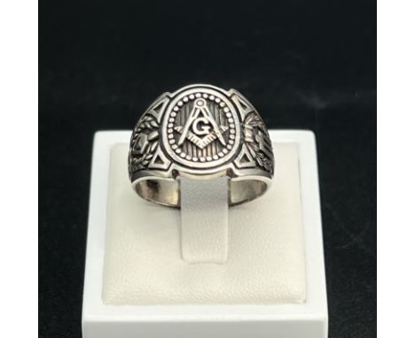 A silver masonic ring,
hallmarked 925,
size T,
8 grams in weight approx
