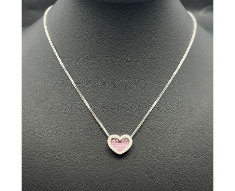 An 18ct white gold heart pendant and chain,
set with pink sapphires and diamonds,
pink sapphires are princess cut stones 2.38