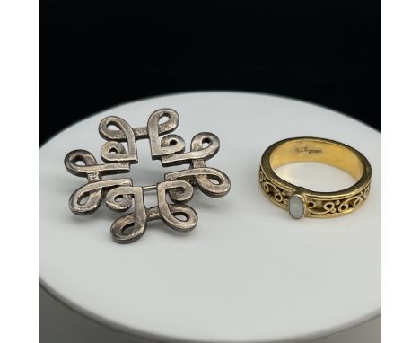 An Ola Gorie brooch,
hallmarked OMG,
28mm,
silver opal ring size M