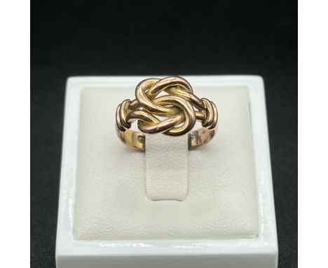 A 9ct Victorian rose gold reef knot ring,
size K,
3.9 grams in weight approx,