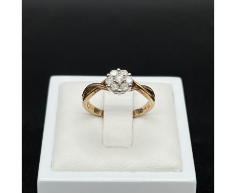 A 9ct yellow gold diamond cluster ring,
2.18 grams in weight,
size K,
fully hallmarked,
0.33ct diamonds