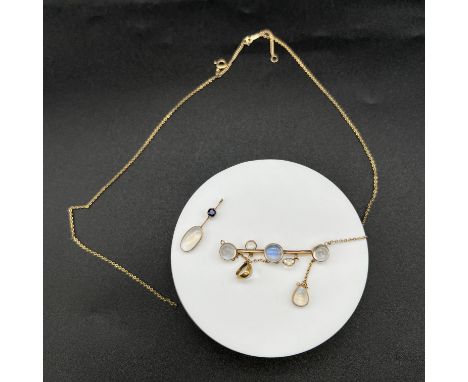 A 9ct yellow gold moonstones pendant and chain,
chain will need repaired,
chain is hallmarked 9ct yellow gold and the pendant