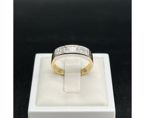 An 18ct yellow gold channel set princess cut diamond ring,
approx 1ct of diamonds,
GH colour and SI2 clarity approx,
channel 