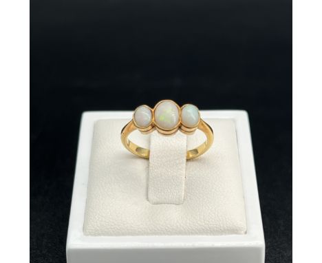 An 18ct yellow gold antique opal ring,
unhallmarked but tested 18ct yellow gold,
size K1/2,
2.7 grams in weight