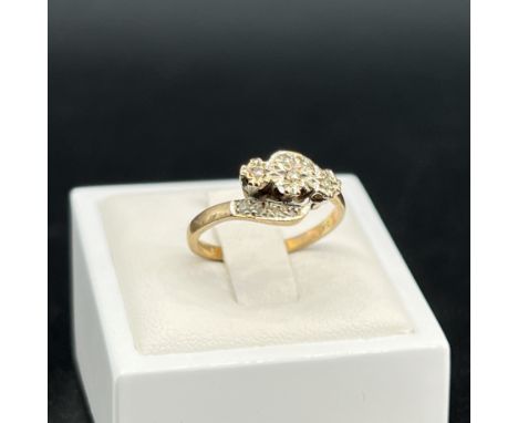 A 9ct yellow gold 3 stone diamond twist ring,
size M,
approx weight is 2.6 grams,
good strong shank and ring is in good condi