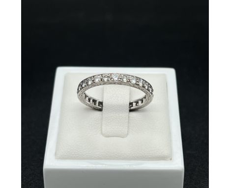 A platinum full eternity ring,
26 round brilliant cut diamonds,
approx 0.85ct total,
clarity SI1-SI2 colour is H-J,
size P ,
