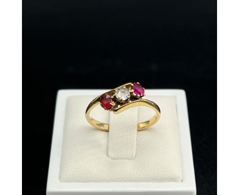 An antique 18ct yellow gold ruby and diamond 3 stone ring,
size N,
diamonds are approx 0.20ct / 0.25ct,
3 grams in weight