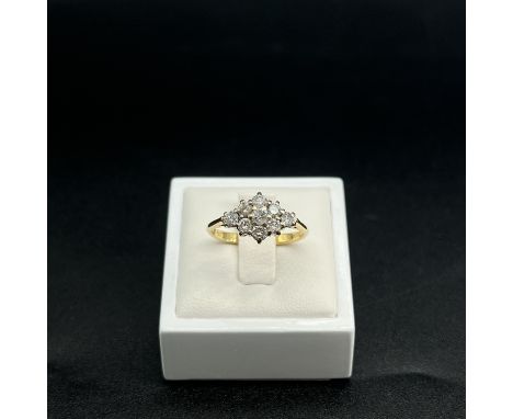 An 18ct yellow gold diamond cluster ring,
set with 1ct of diamonds,
size M