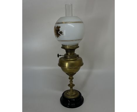 A large brass tilly lamp