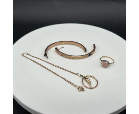 A mixed lot of 9ct gold,
hallmarked,
broken bangle ring and pendant chain,
10.70grams in weight