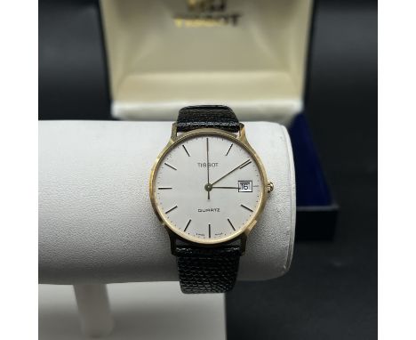 A 9ct gold case Tissot watch,
hallmarked inside the case,
perfect working order,
original box but no papers,