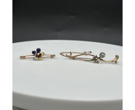 2x 9ct yellow gold brooches,
one is aqua and seed pearl 50mm x 10mm,
other brooch is enamel and diamond set 35mm x 12mm,
tota