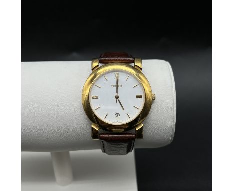 A Gents Tissot Watch,
In working order,
Leather Strap,
not original buckle,
36mm Dial,