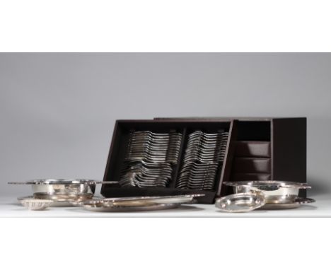 CHRISTOFLE menagere filet coquille pattern with cutlery and serving dishes. Christofle is a French goldsmith and tableware co