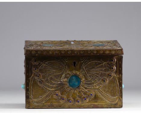 Alfred Louis-Achille DAGUET (1875-1942) Rectangular wooden case entirely covered with brass plates decorated in embossed gold