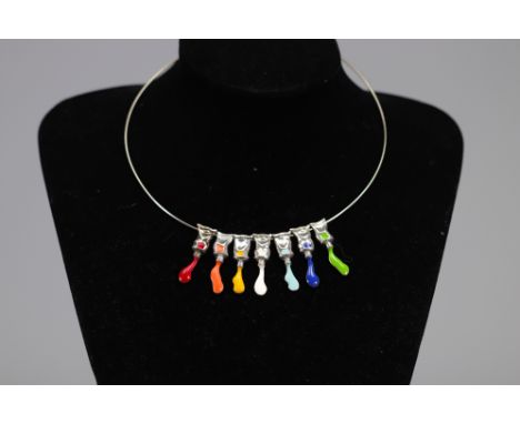 Arman Fernandez (1928-2005). "Tube Cast". 2001. Necklace adorned with eight tubes of colored enamel aluminum and silver-plate