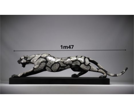 Sculpture of a panther from the 1970s. The panther is in attack position, with its shiny silver spots. - Weight: 16.80 kg - S