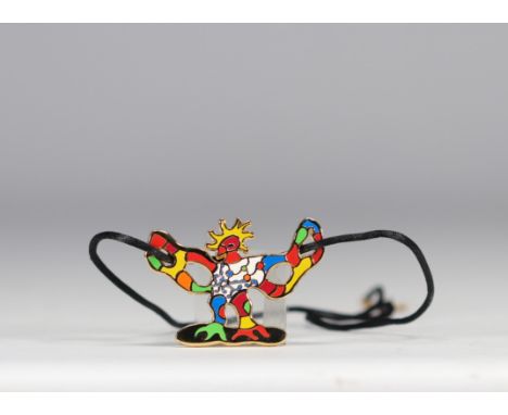 Niki de Saint Phalle (1930-2002). "L'oiseau au feu. Circa 2000. Gold-plated metal and polychrome enamel enamel, with silk cor
