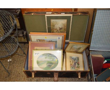 Vintage steamer trunk containing a quantity of mixed pictures
