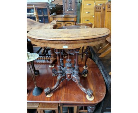 A Victorian inlaid walnut demi-lune card table. Condition- fading to top, various surface marks and scratches, some losses of