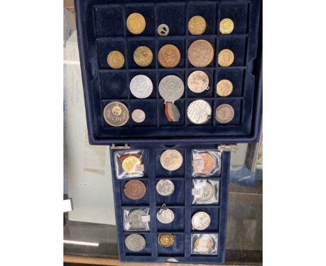 A case of world coin, medallions and tokens etc. 