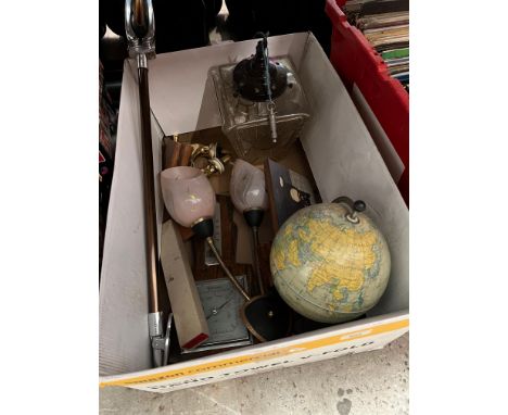 A box of miscellaneous including a shooting stick / seat, a globe, a lantern, brass taps, barometer, wall light fitting, a Sp