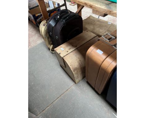 2 vintage cases together with a luggage carrier, a metal bread bin and a picnic rucksack. 