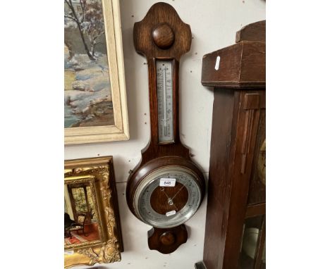 An oak barometer. 