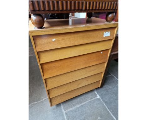 A mid 20th century light oak chest of drawers. 