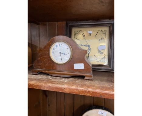 An Addison wall clock advertising Beefeater gin, another wall clock, and a mantle clock 