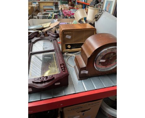 An Art Deco Napoleon style mantel clock together with a wall hanging clock and a vintage Figaro radio. 