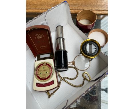 A mixed lot including a pair of Jockey Club Paris binoculars, miniature telescope, tripod desk magnifying glass etc.