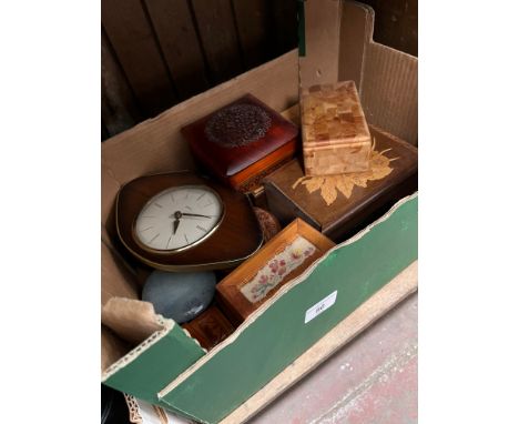 A collection of treen boxes, trinket boxes etc together with a mantel clock. 