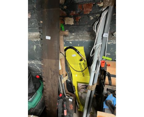 A bundle of garden tools to include extending 3 loppers, spade, fork, shears, 2 man saw, large saw, weed burn 