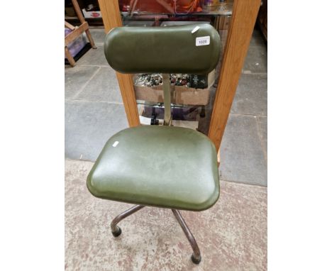 A vintage adjustable swivel chair 