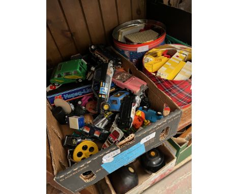 A box of toy vehicles including Corgi, Dinky, along with 2 tins of Lego 